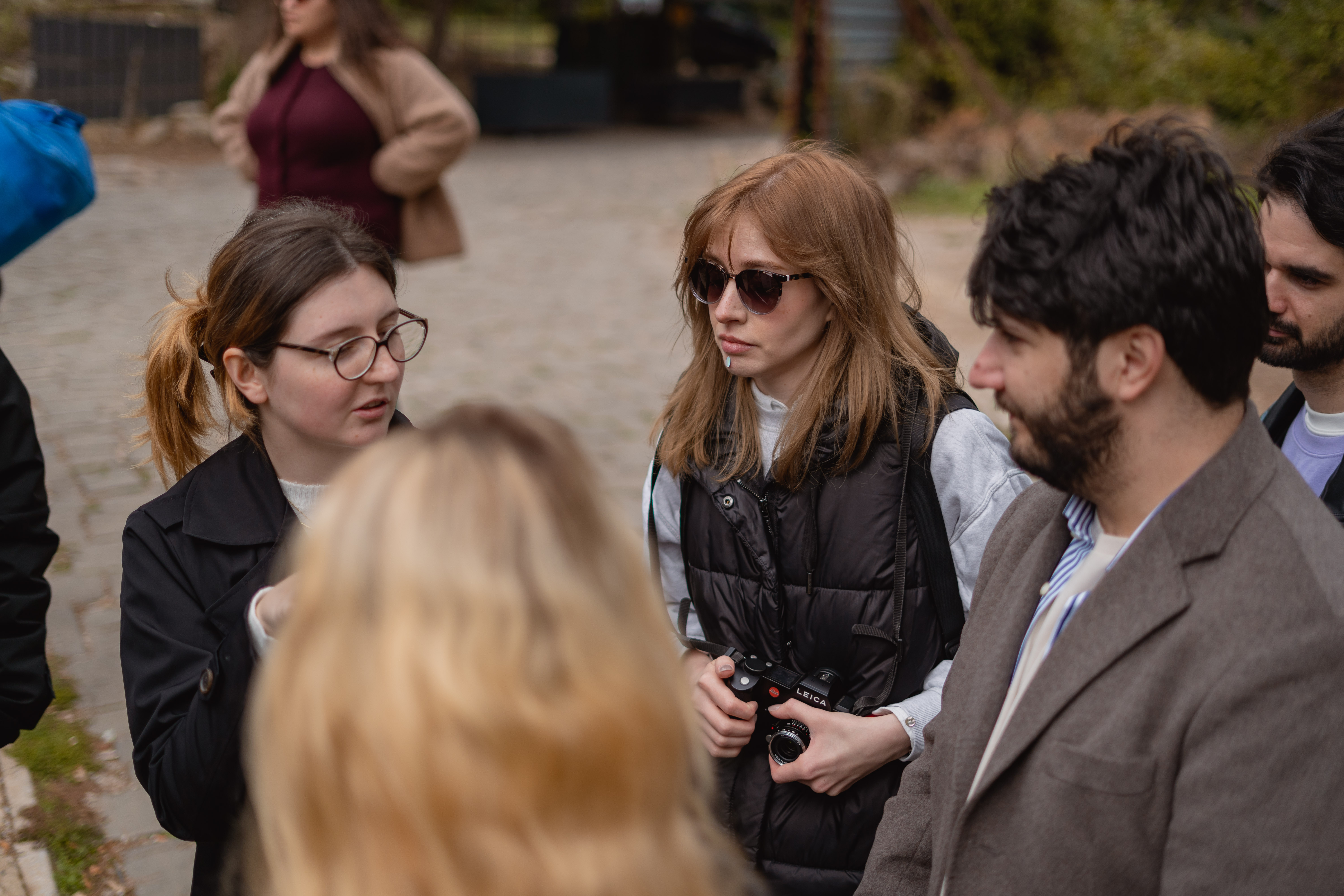 The Pistacio team talking outdoors on a spring afternoon.